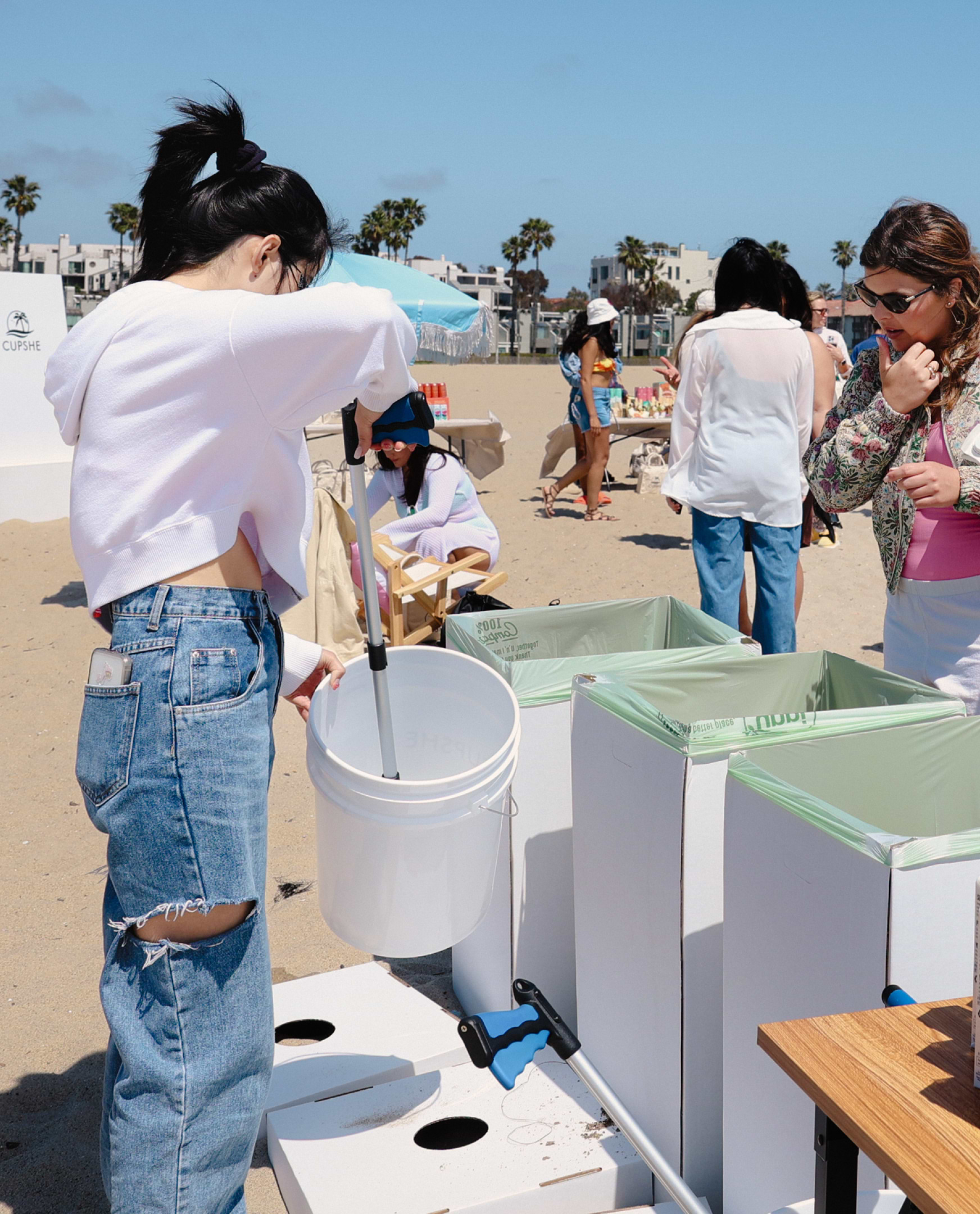 Community members cleaning a beach