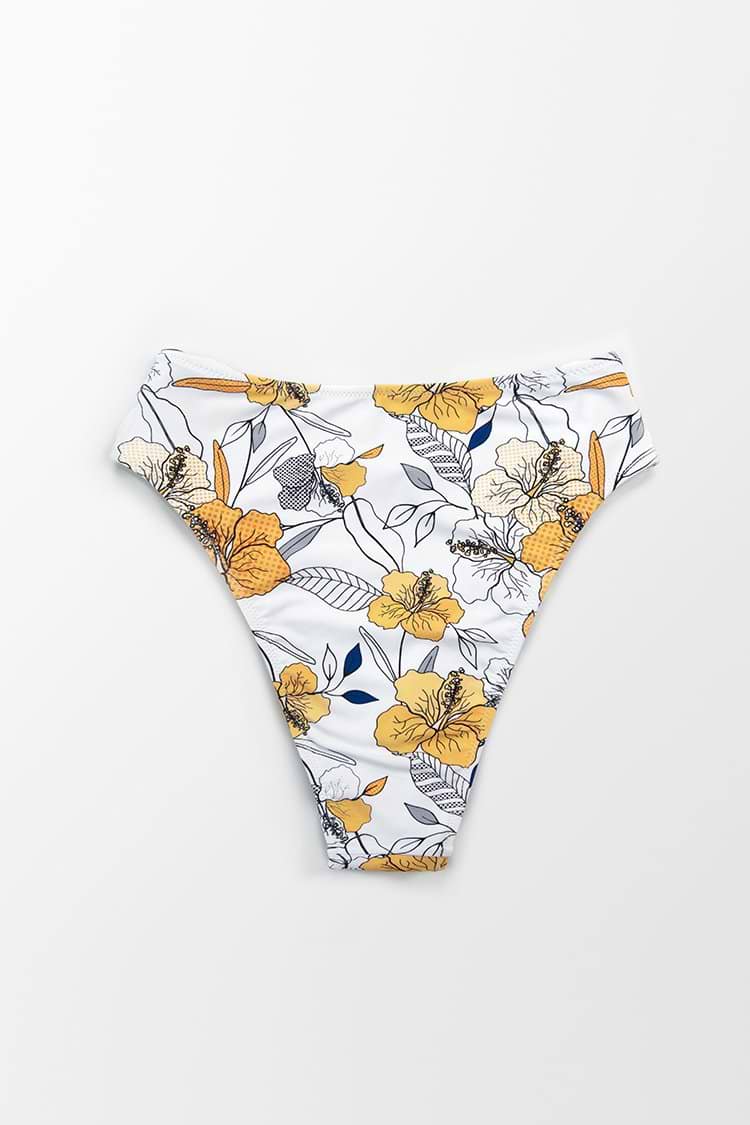 Bas de bikini blanc à découpes noué à fleurs