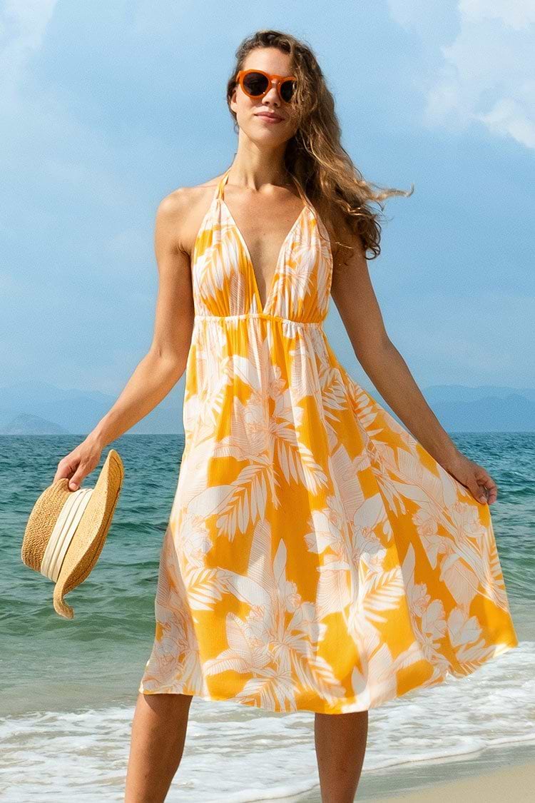 Robe décolleté licou imprimé tropical