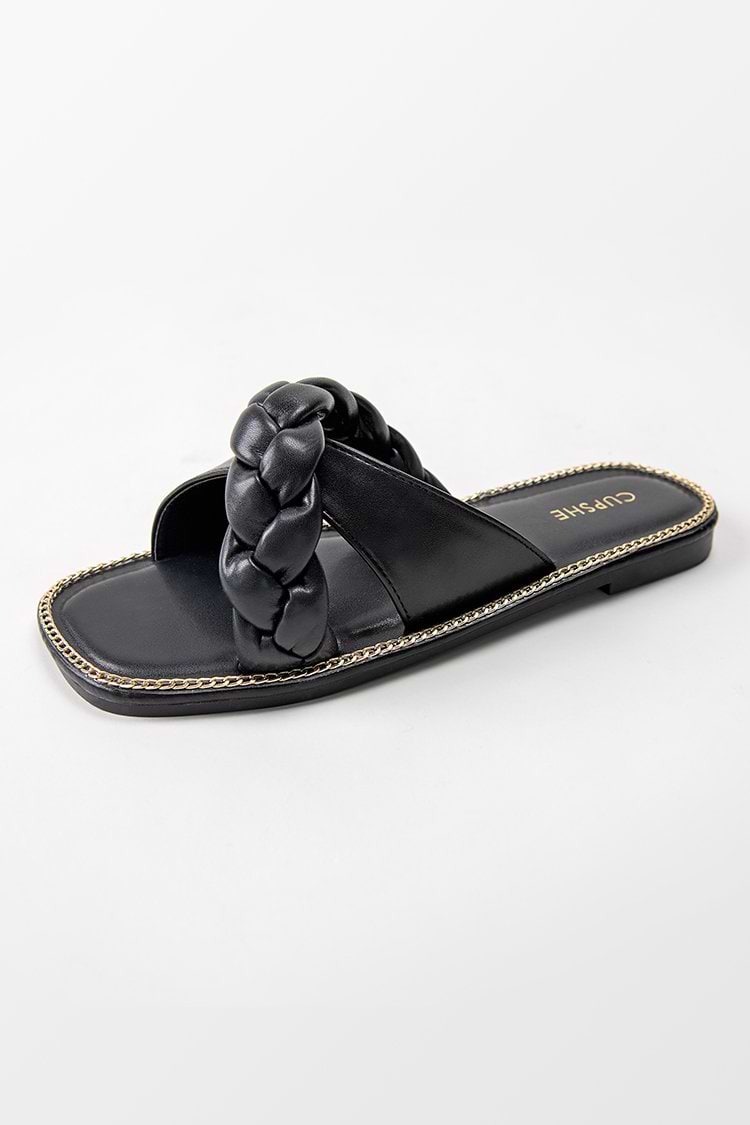 Schwarze, geflochtene Sandalen mit gekreuzten Riemen