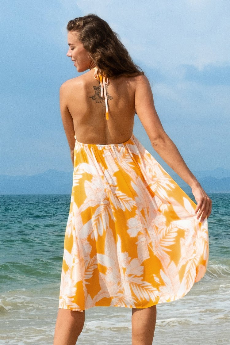 Robe décolleté licou imprimé tropical