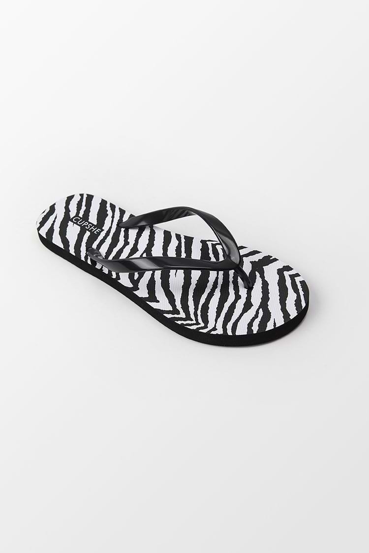 Zebra gestreifte Zehentrenner-Sandalen