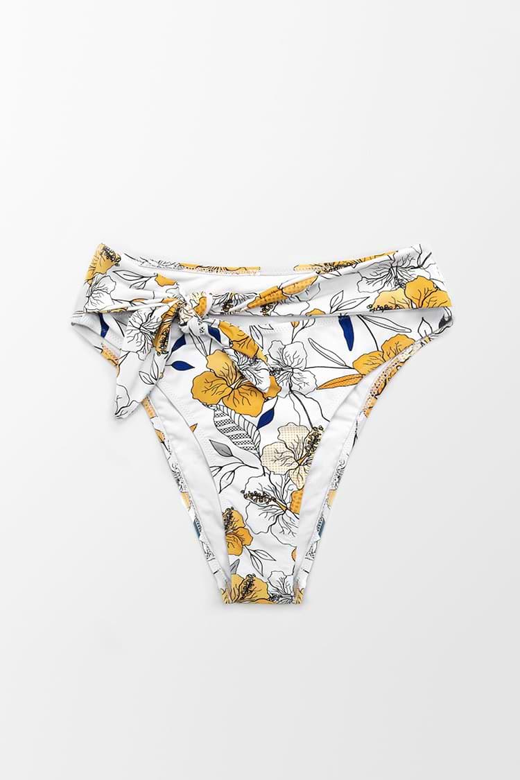 Bas de bikini blanc à découpes noué à fleurs