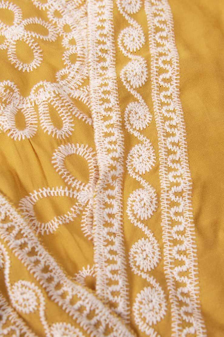 Cover-up mit V-Ausschnitt und Häkeln Design