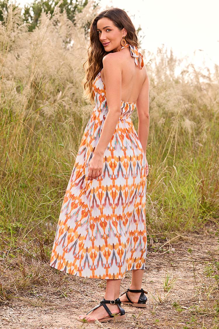 Robe dos nu croisée et imprimé géométrique