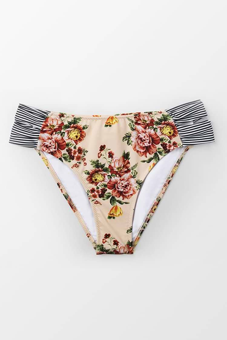 Bas de bikini à fleurs aux côtés coupés de biais