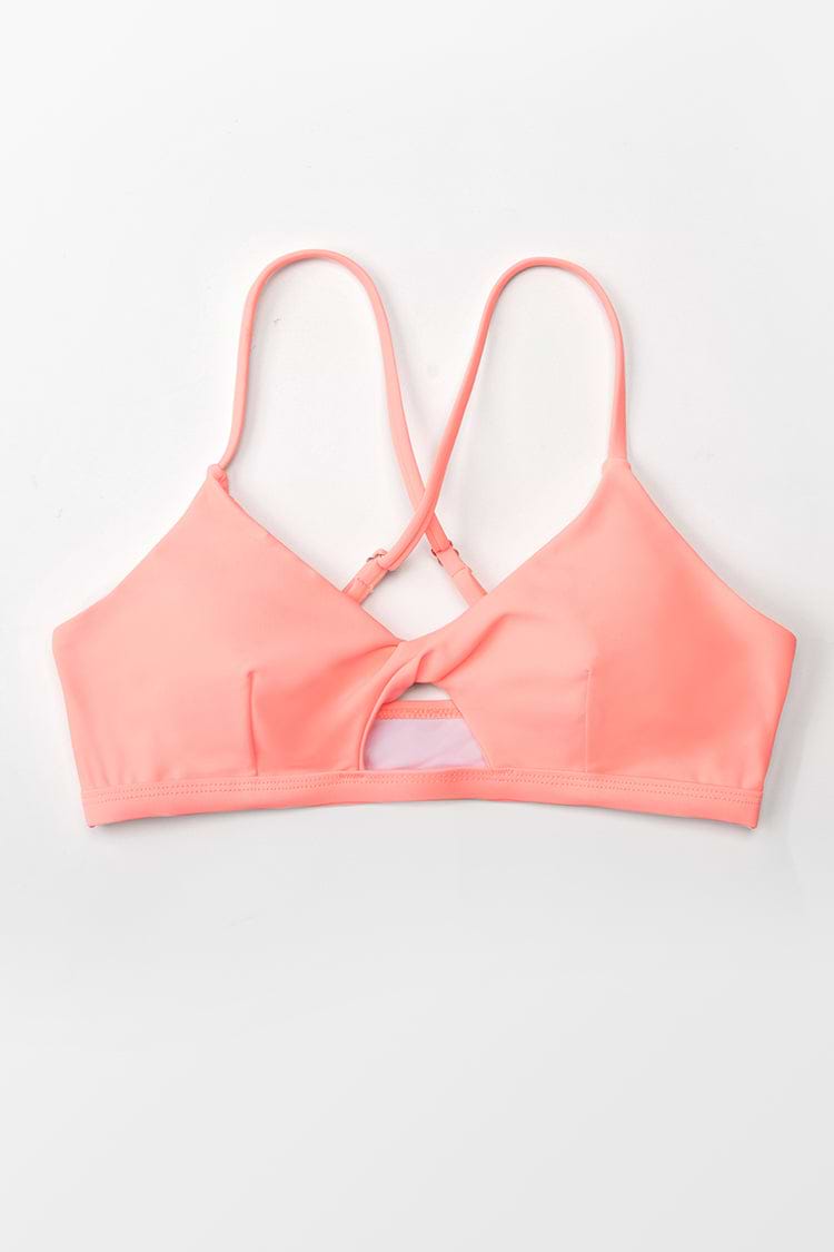 Haut de bikini rose croisé à découpes torsadées