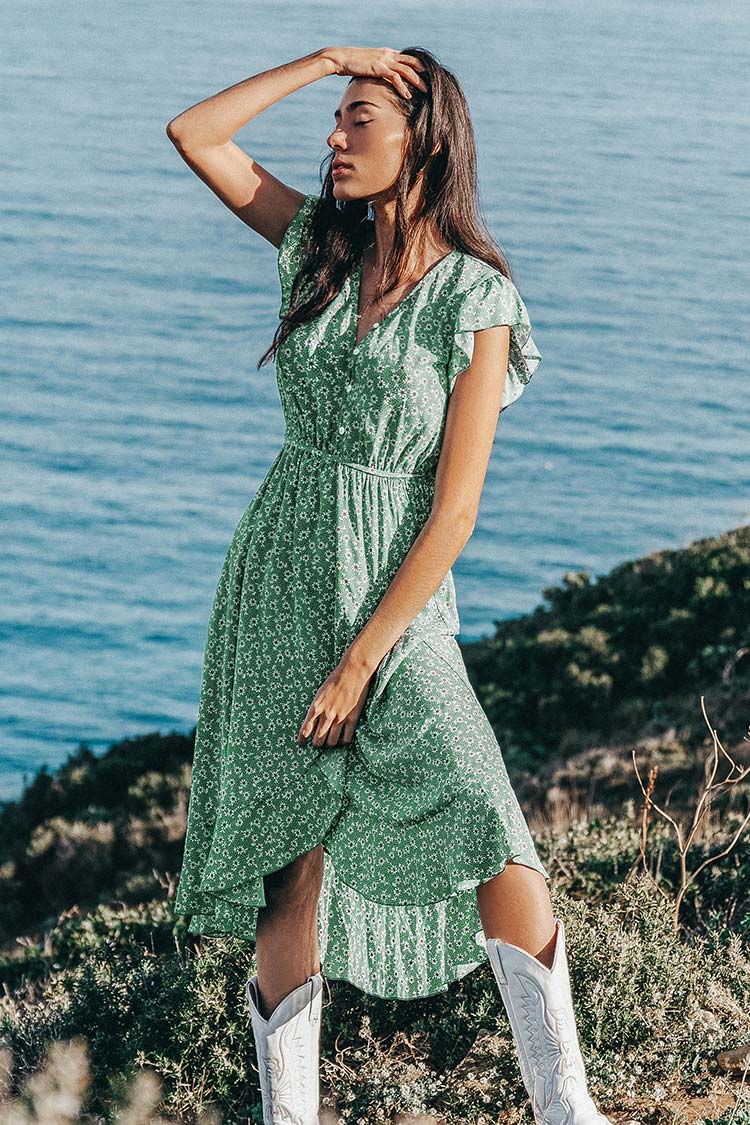 Kleid mit blaugrünem Blumendruck