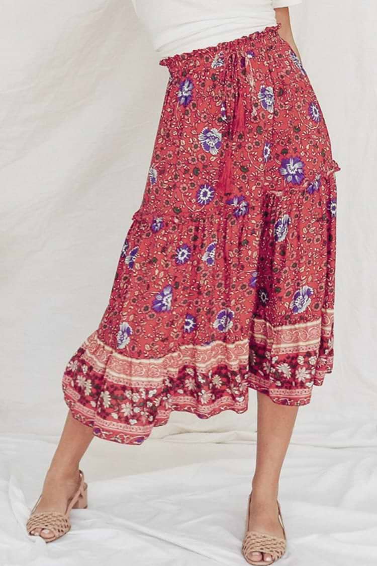 Jupe mi-longue à volants et imprimé fleuri rouge
