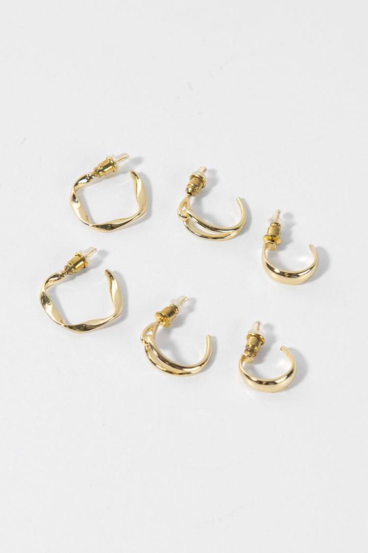 Boucles d'oreilles brillantes de couleur unie