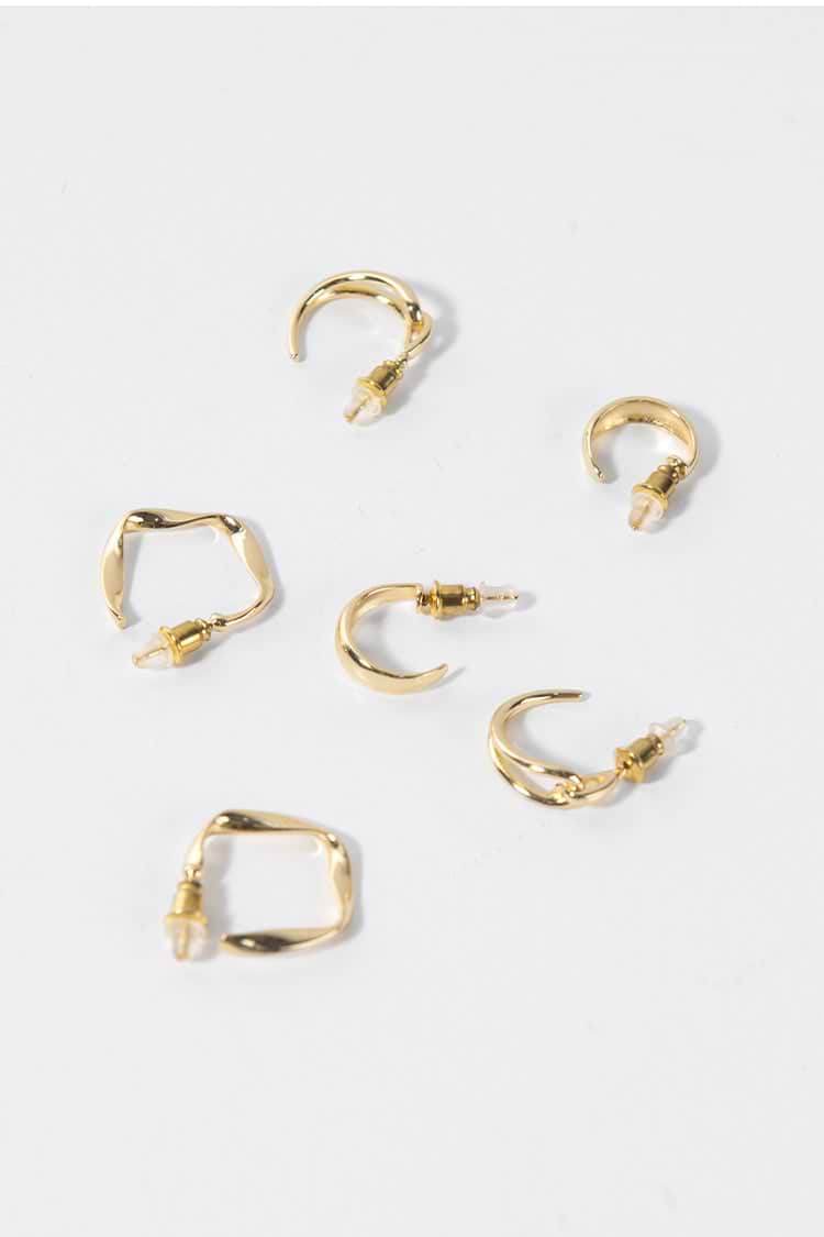 Boucles d'oreilles brillantes de couleur unie