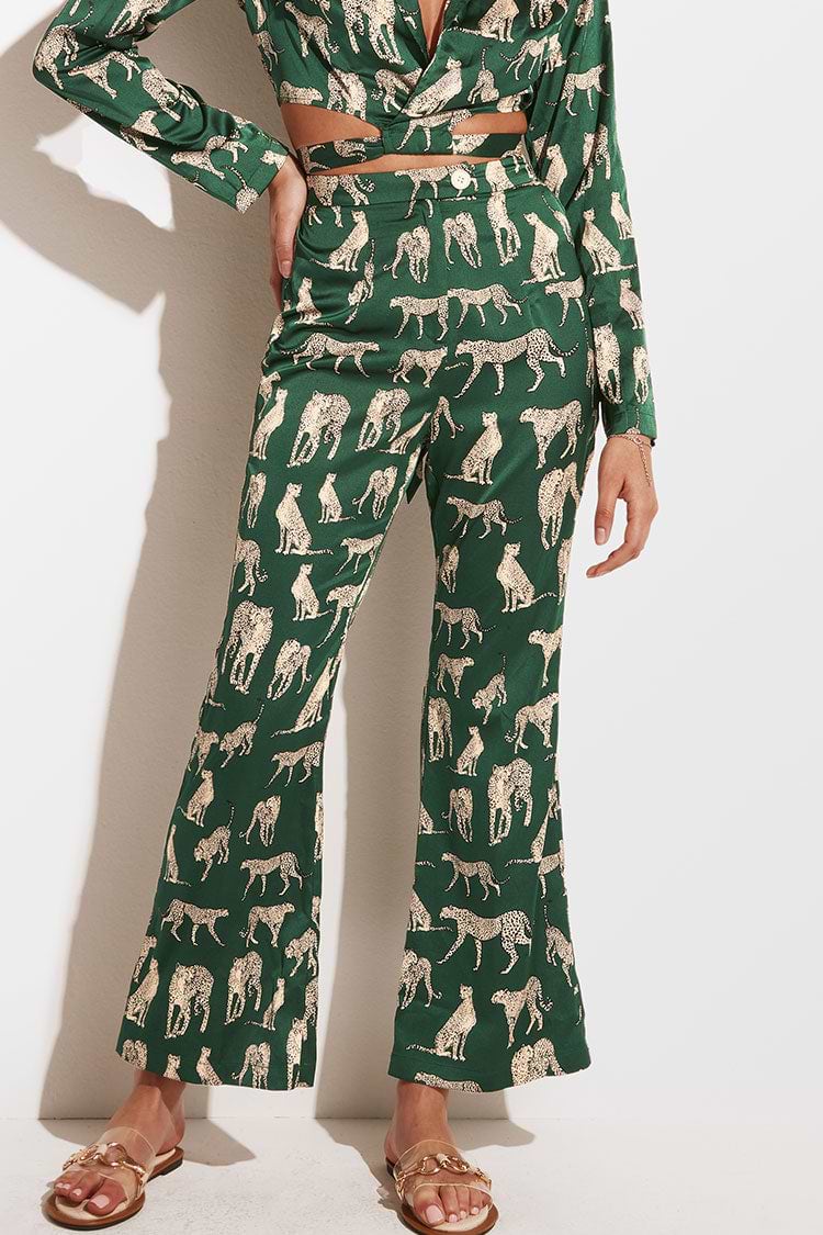 Pantalon évasé à imprimé animalier avec un zip sur le devant