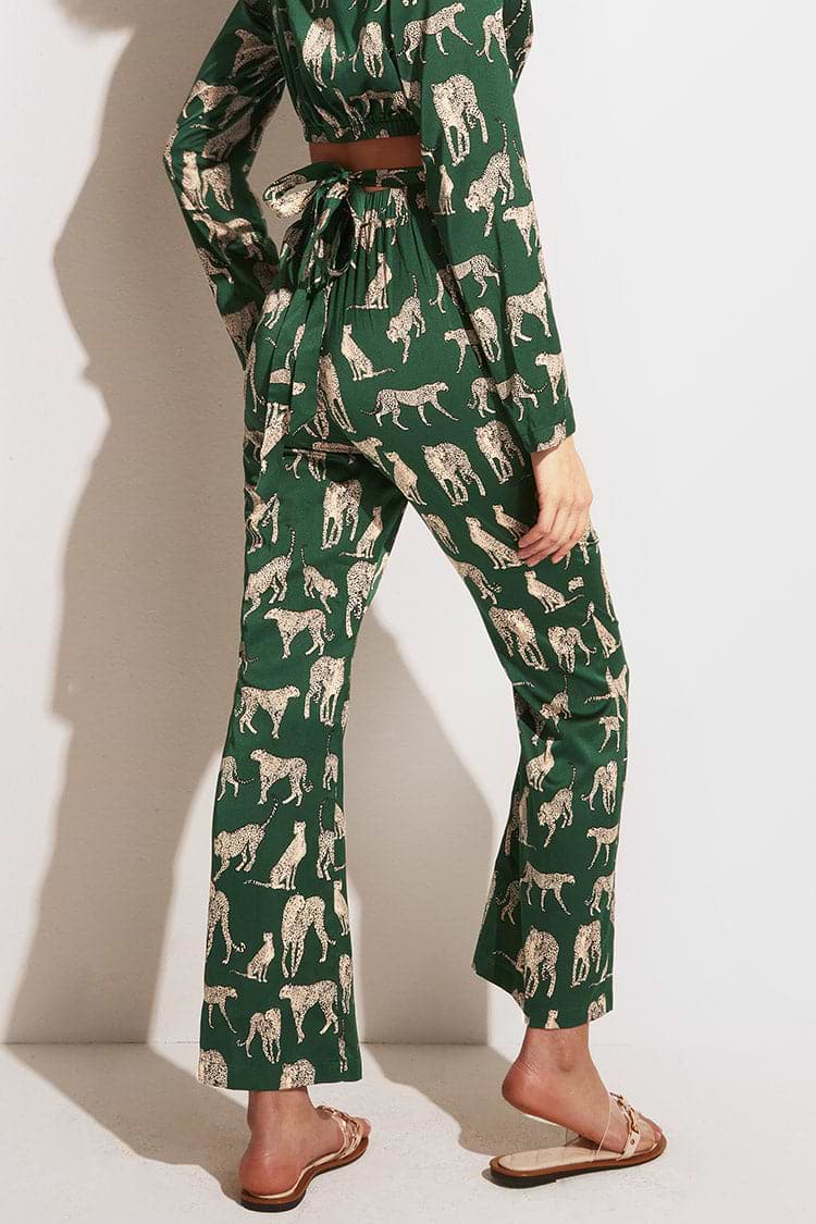 Pantalon évasé à imprimé animalier avec un zip sur le devant