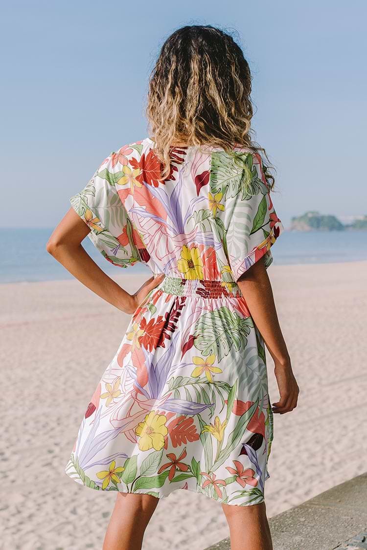 Robe mi-longue fleurie zippée à col en V