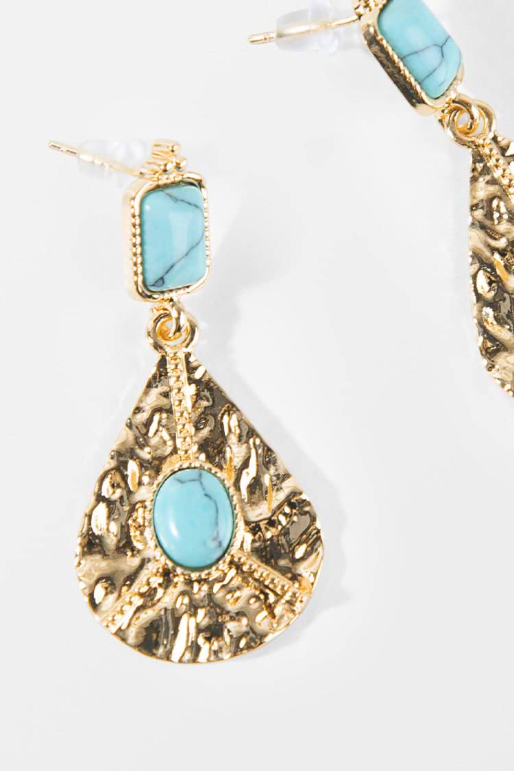 Tophus-Ohrringe mit geometrischem Print