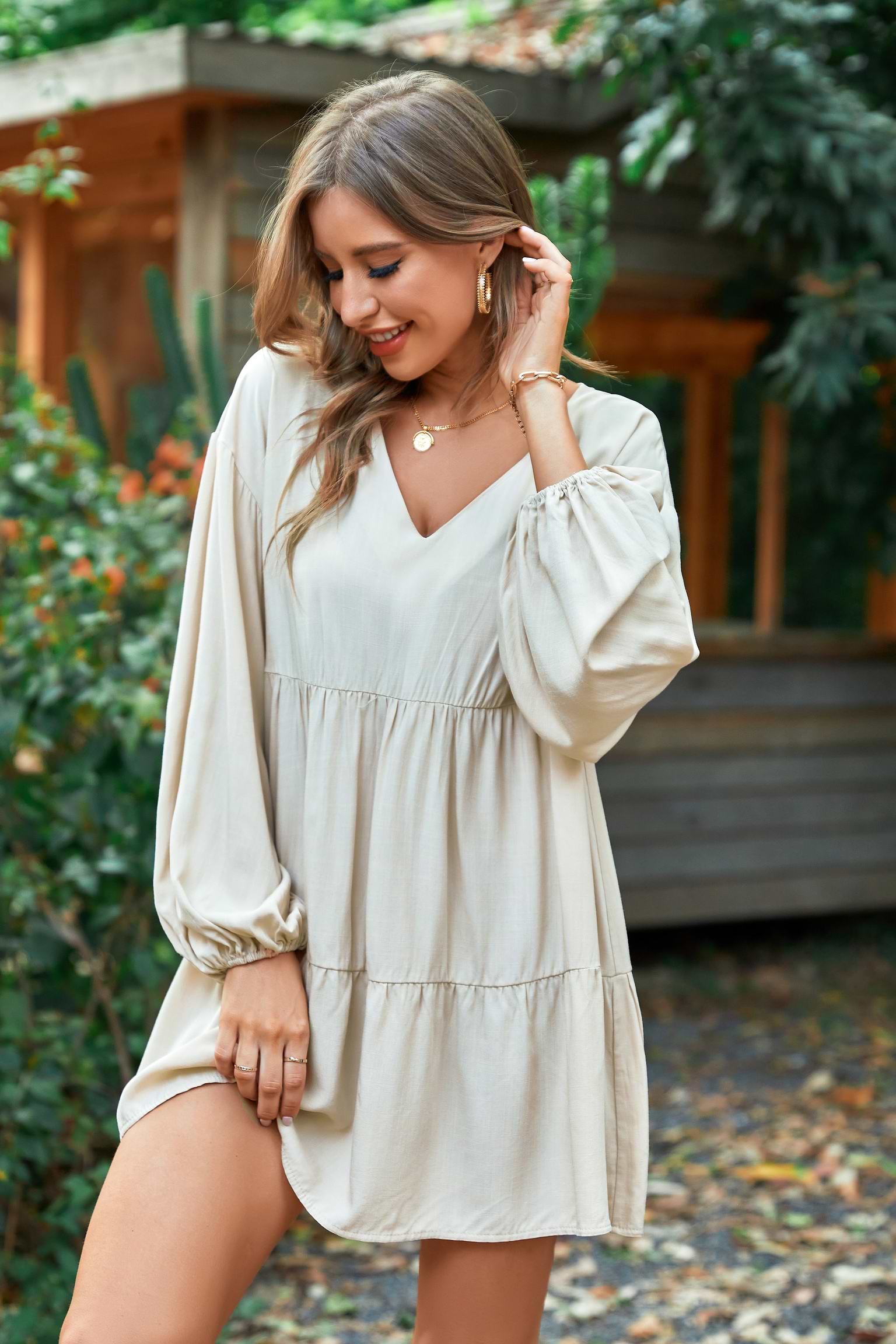 Vestido Cofete de color albaricoque con escote V y en forma de A