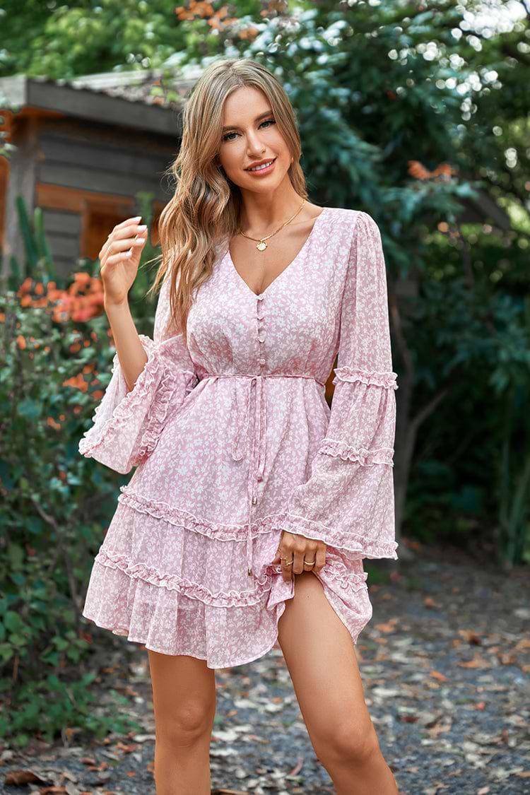 Vestido Varadero rosa con escote V y mangas de campana