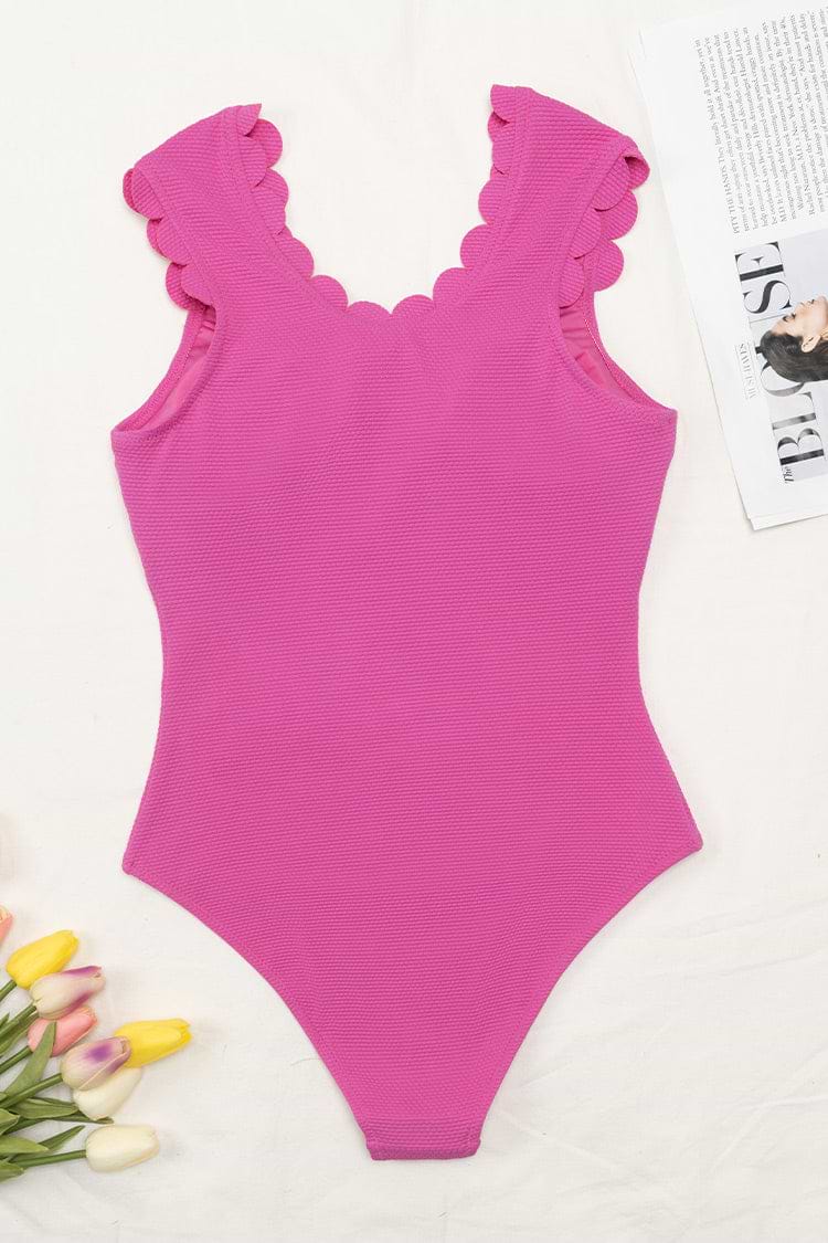 Maillot de bain une pièce festonné rose à col en V