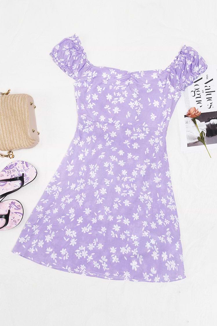 Robe à découpes avec nœud papillon et volants