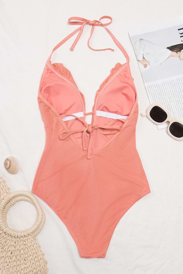 Maillot de bain une pièce rose à col plongeant et à volants