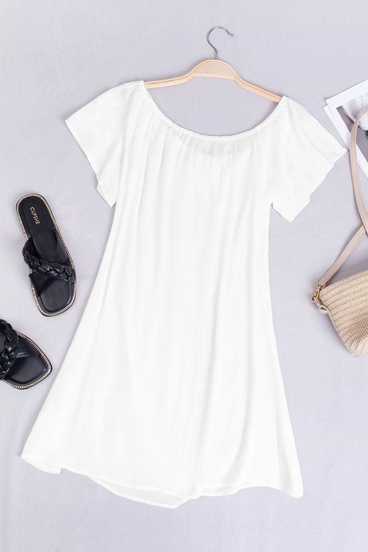 Vestido blanco con cordones y hombros descubiertos de Paloma