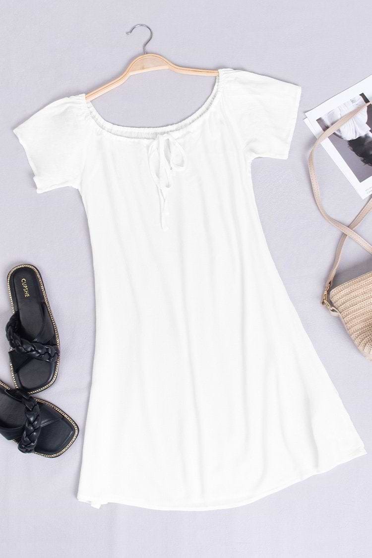 Vestido blanco con cordones y hombros descubiertos de Paloma