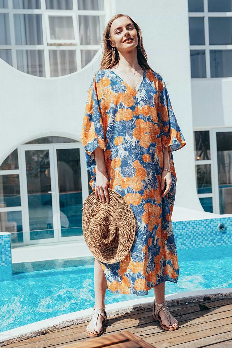 Aquarius Cover Up con dobladillo irregular y escote V