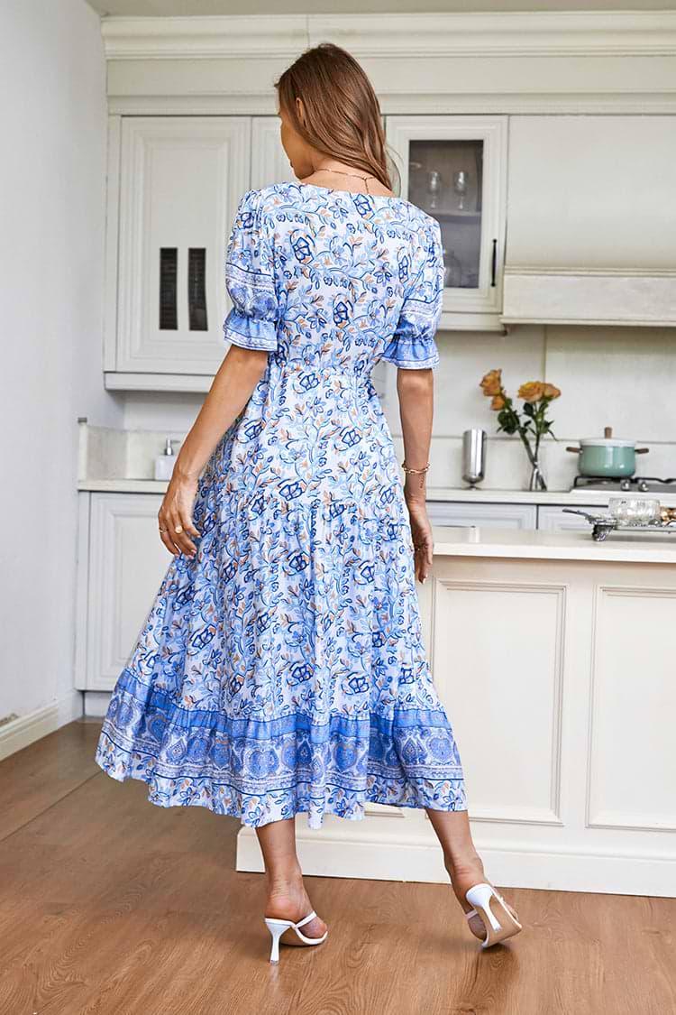 Gusta Vestido en forma de A con escote V y mangas abullonadas