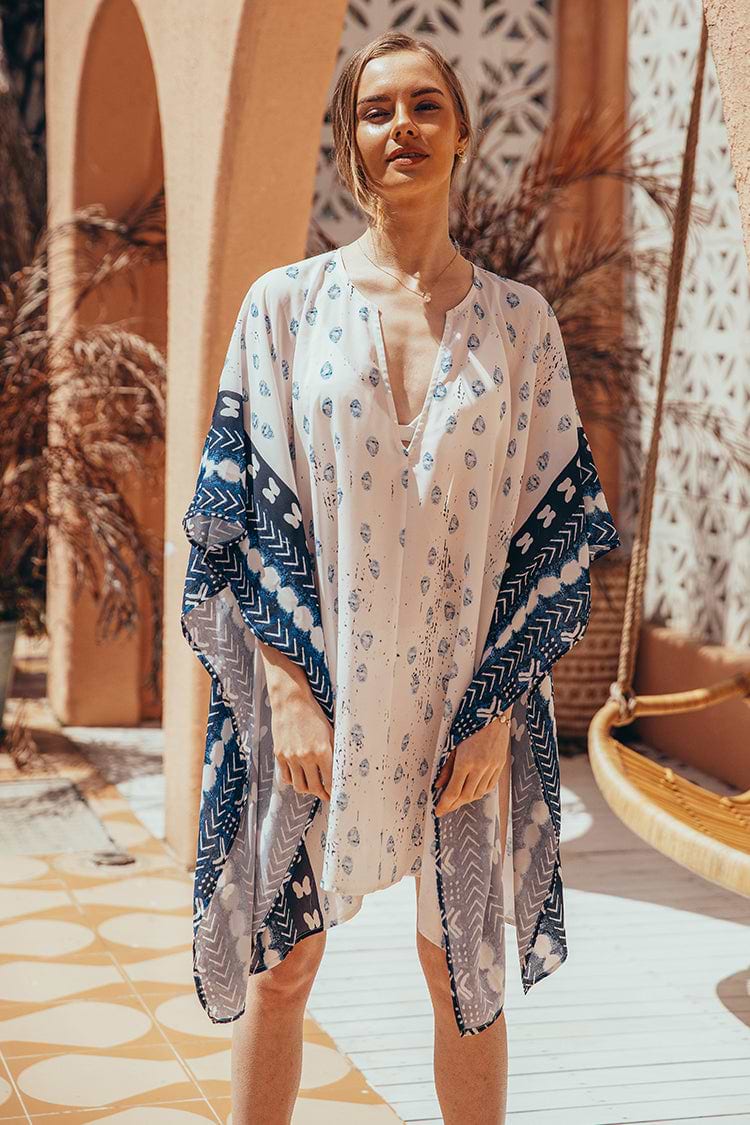 Cover-Up mit unregelmäßigem Saum und halben Ärmeln