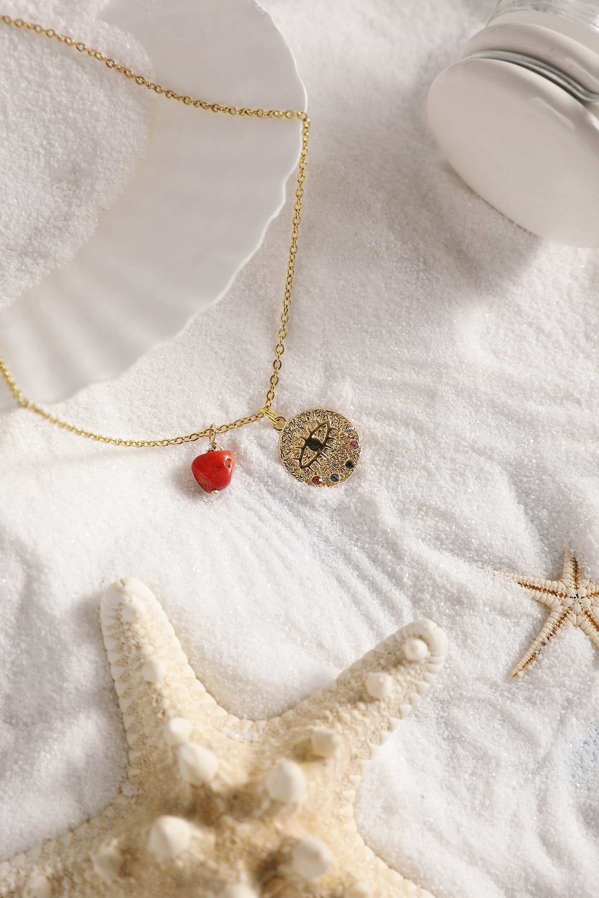 Collier rouge à imprimé géométrique