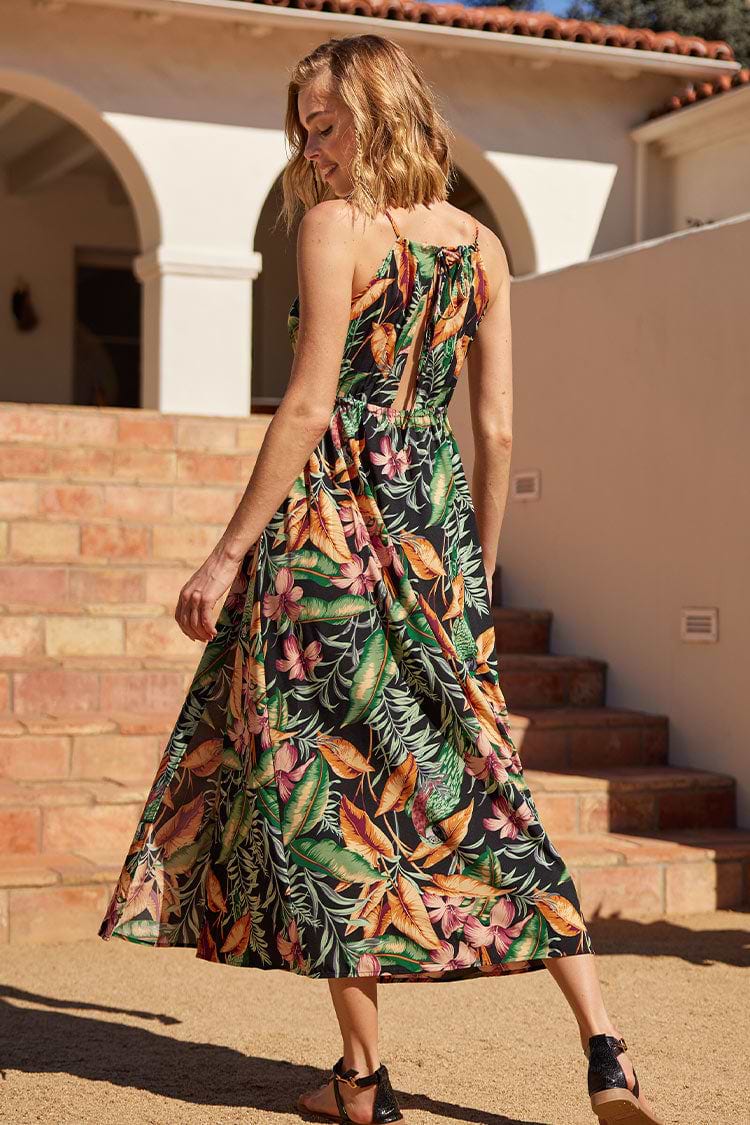 Vestido entallado con escote halter y estampado de plantas tropicales