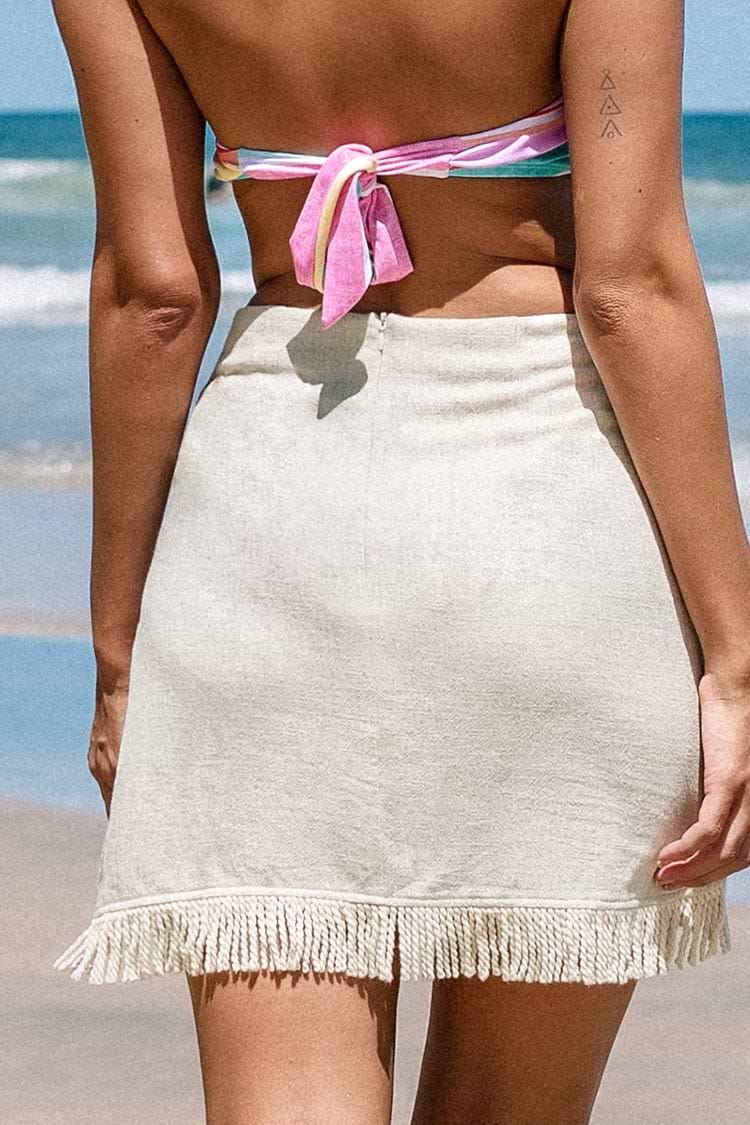 Pareo envolvente y dividido con borlas