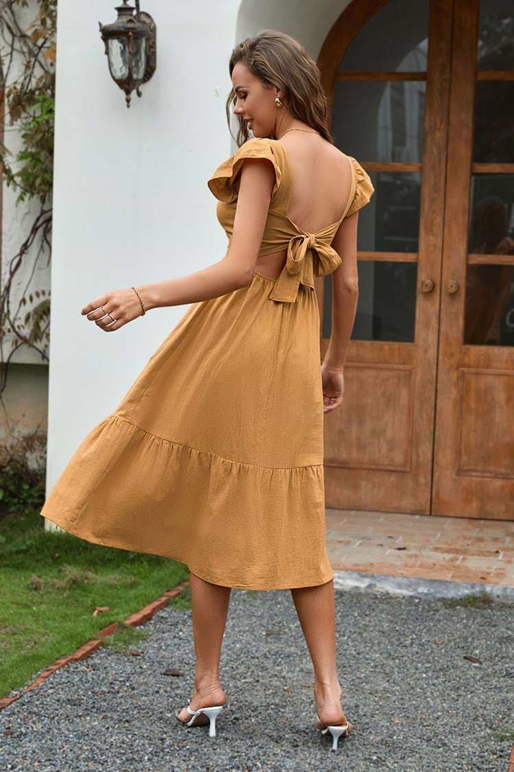 Vestido en forma de A con volantes y lazo anudado