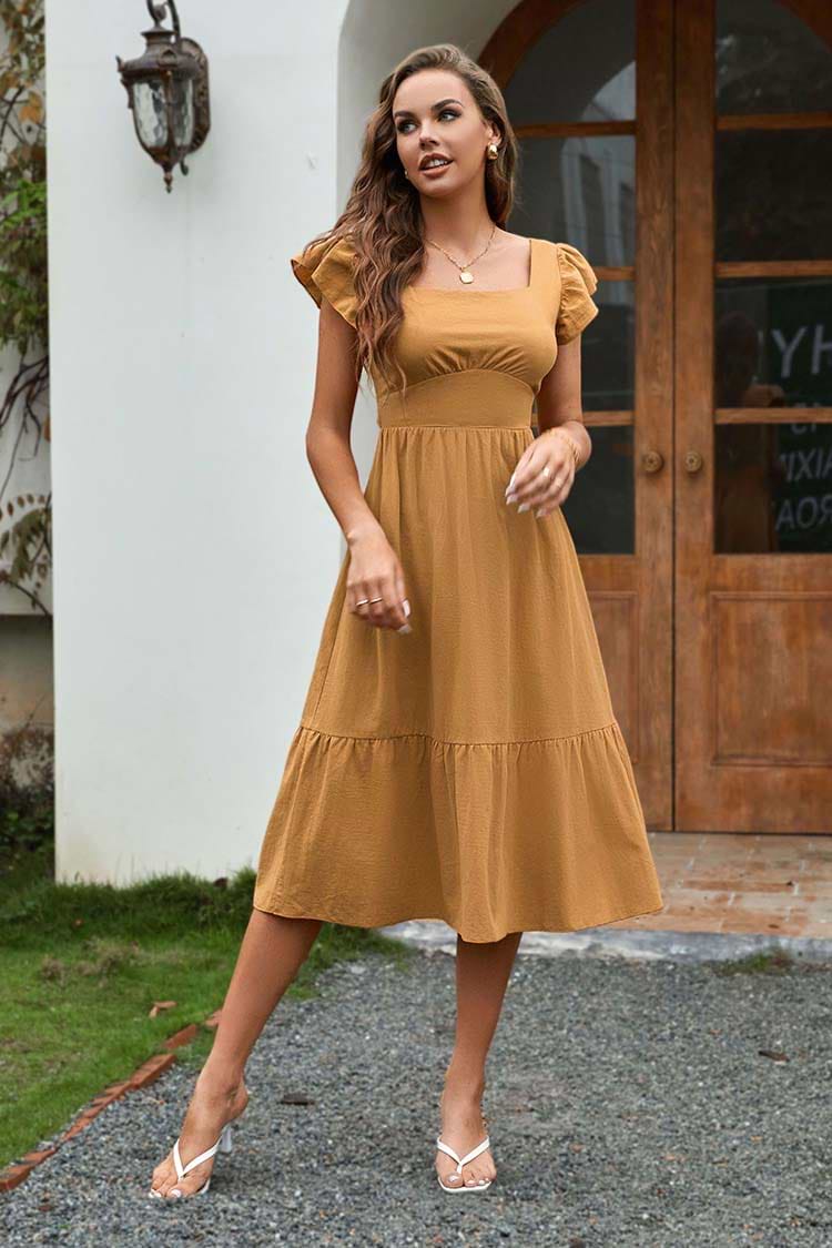Vestido en forma de A con volantes y lazo anudado