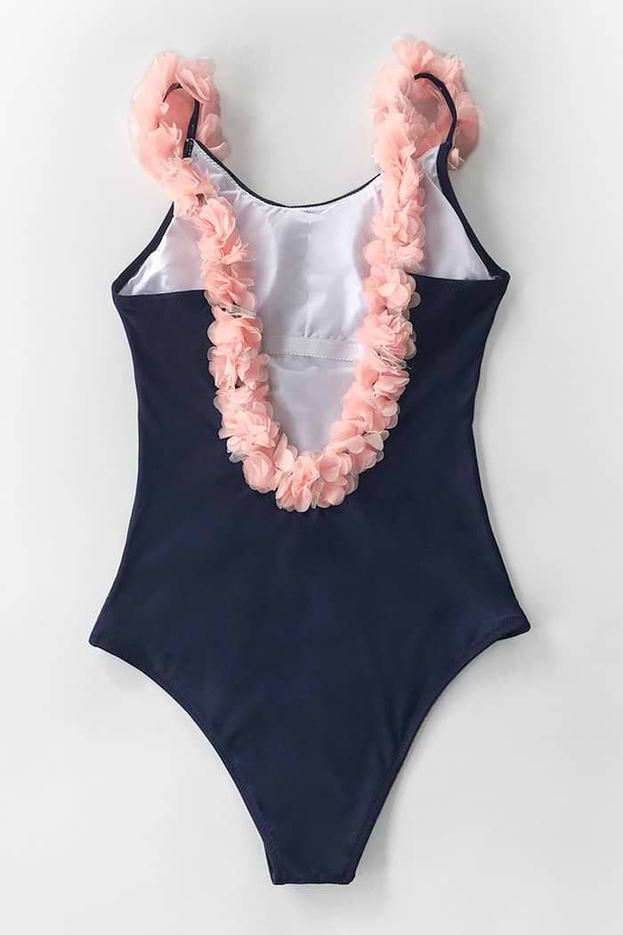 Einteiliger Badeanzug mit Blumenapplikationen