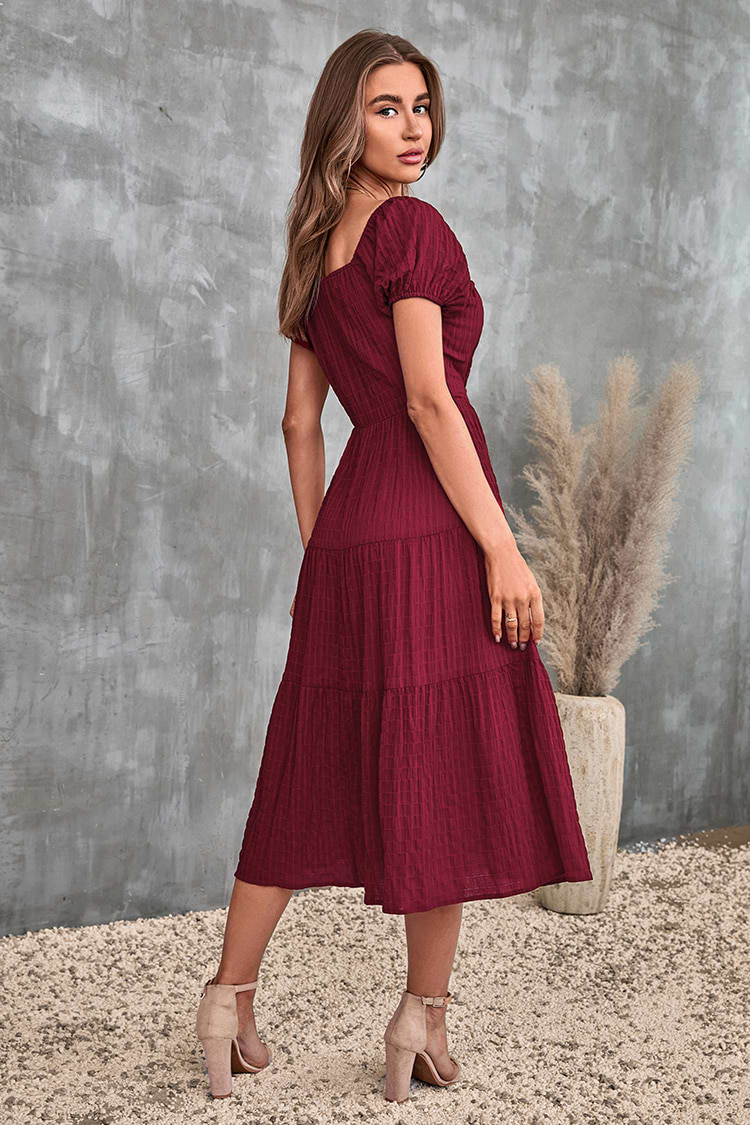 Robe trapèze découpée à manches bouffantes