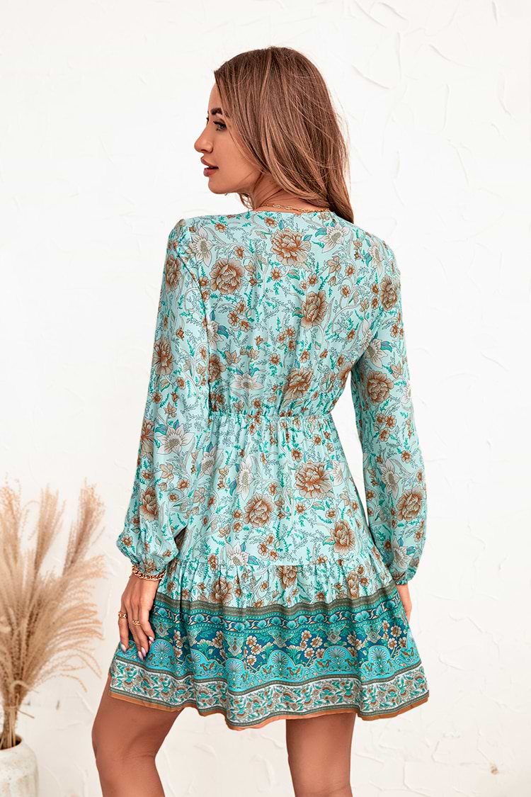 Robe trapèze midi et ruchée à manches bouffantes