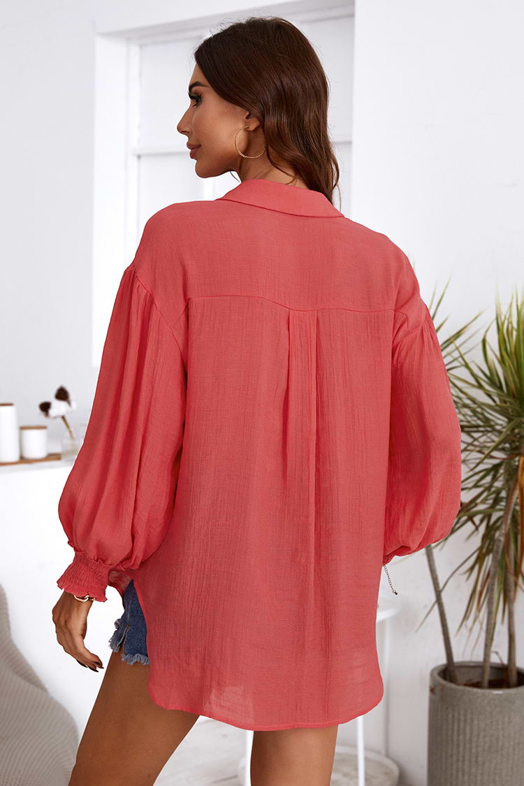 Cover up boutonné rose à manches bouffantes