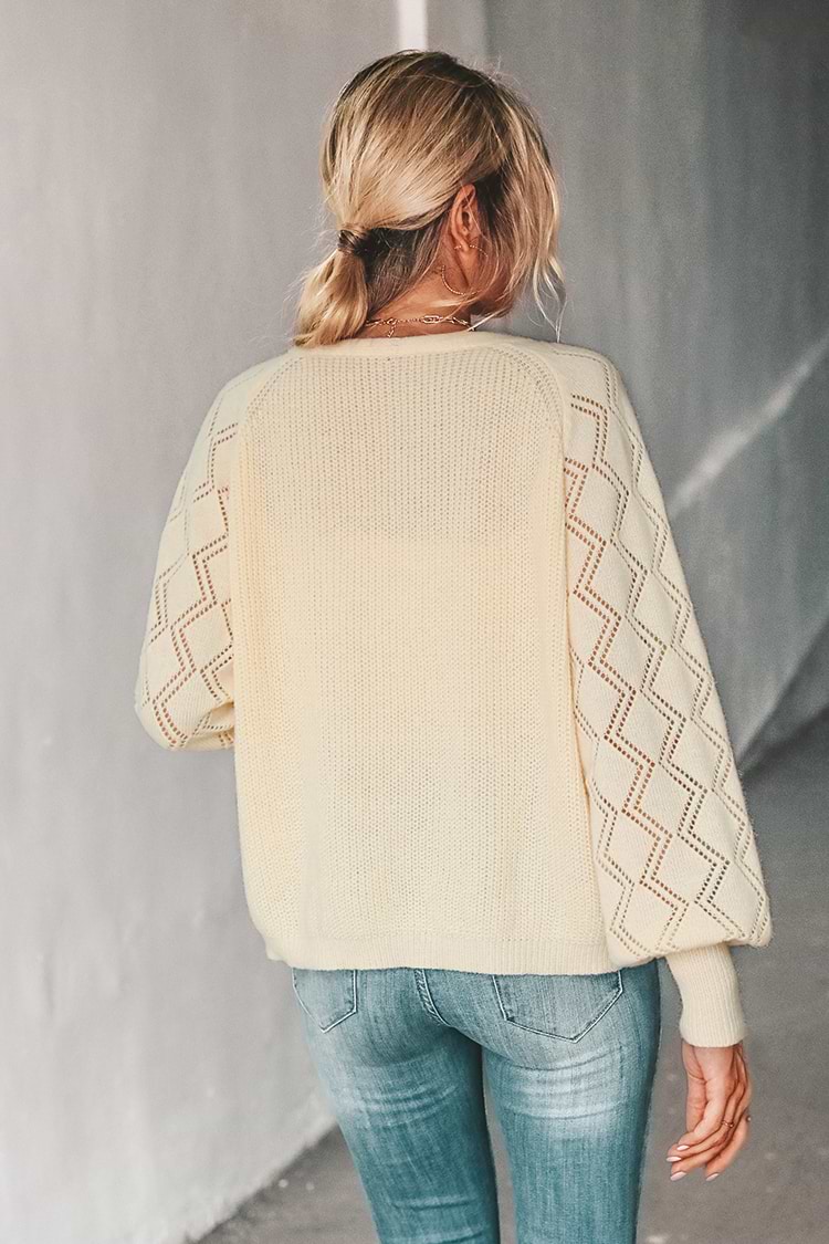 Cardigan boutonné en tricot au crochet