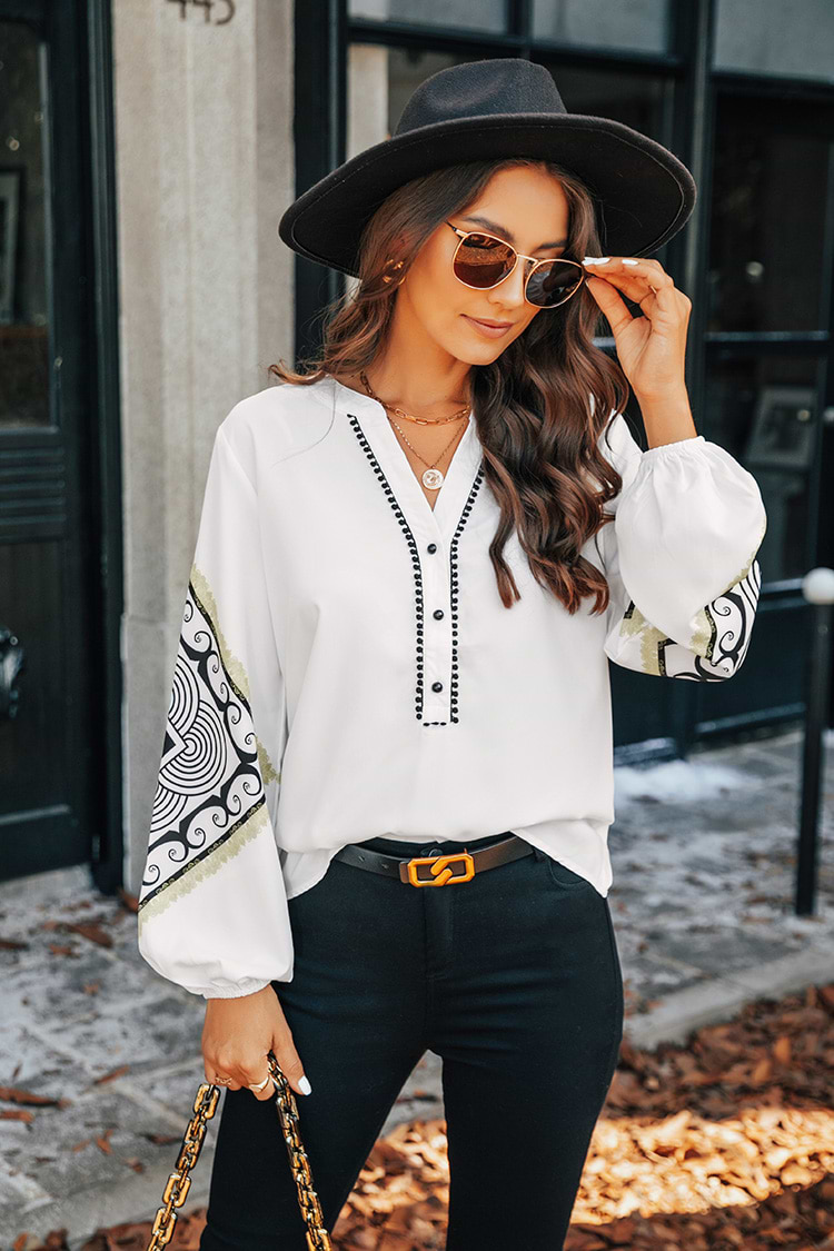 Bluse mit Tribal-Print und Pom-Pom-Besatz