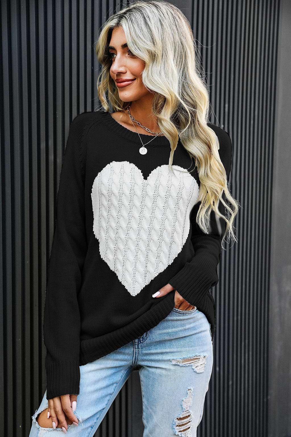 Pull en tricot torsadé à motif de cœur