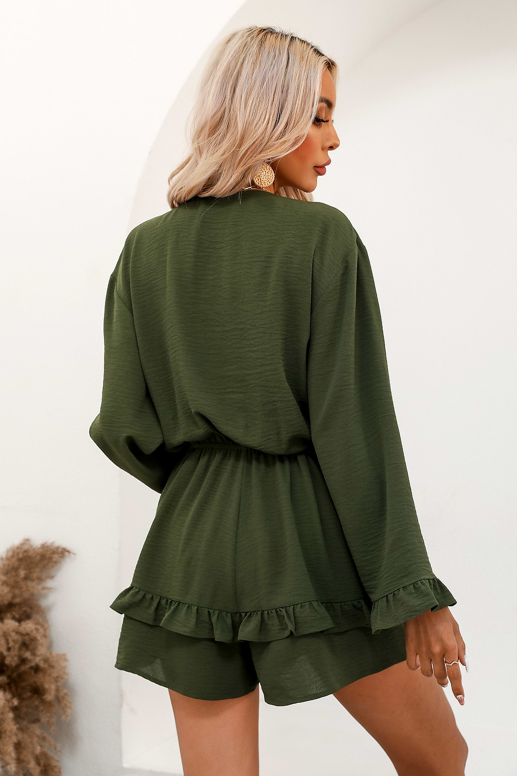 Mameluco con volantes y cordón