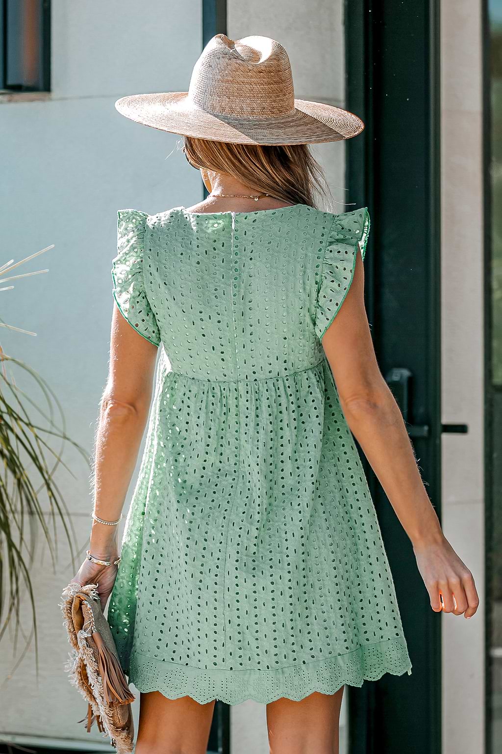 Robe babydoll à oeillets fleuris