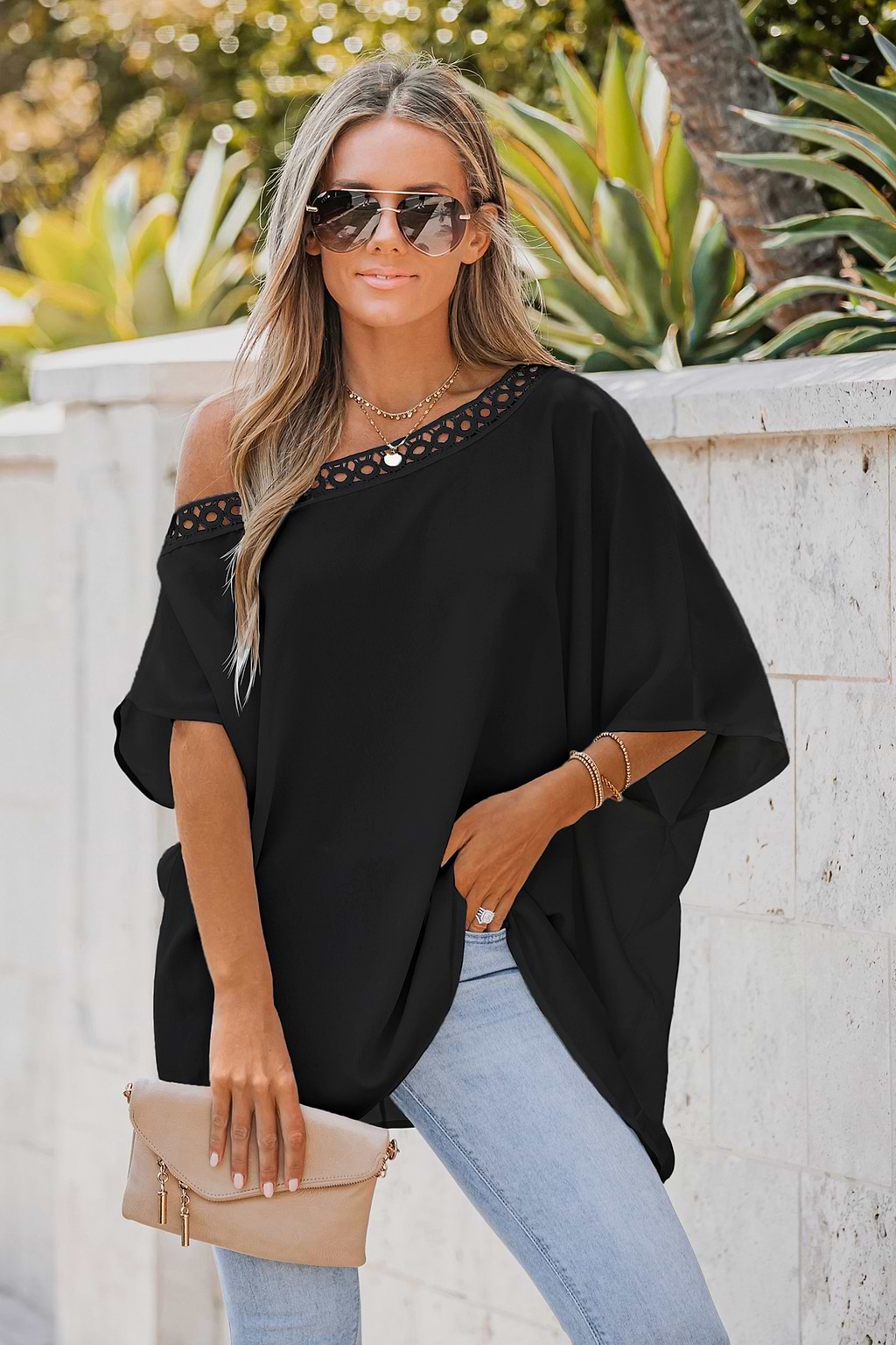 Onyx kanten uitgesneden one-shoulder top