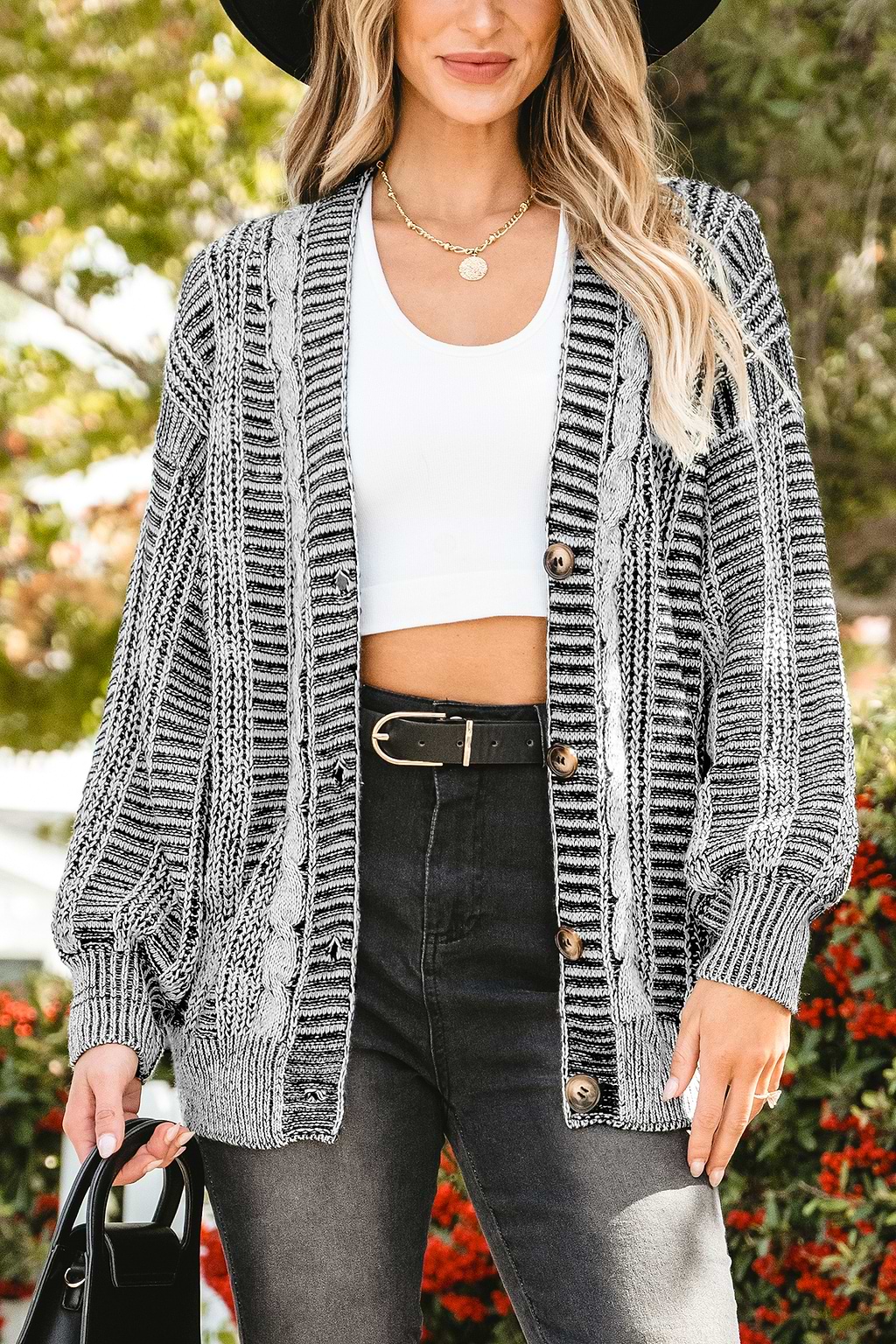 Cardigan avec col en V en tricot torsadé à rayures