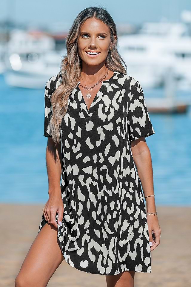 knee length dresses for ladies Entro Black Leopard Trim Quarter Zip Mini Dress main image 0