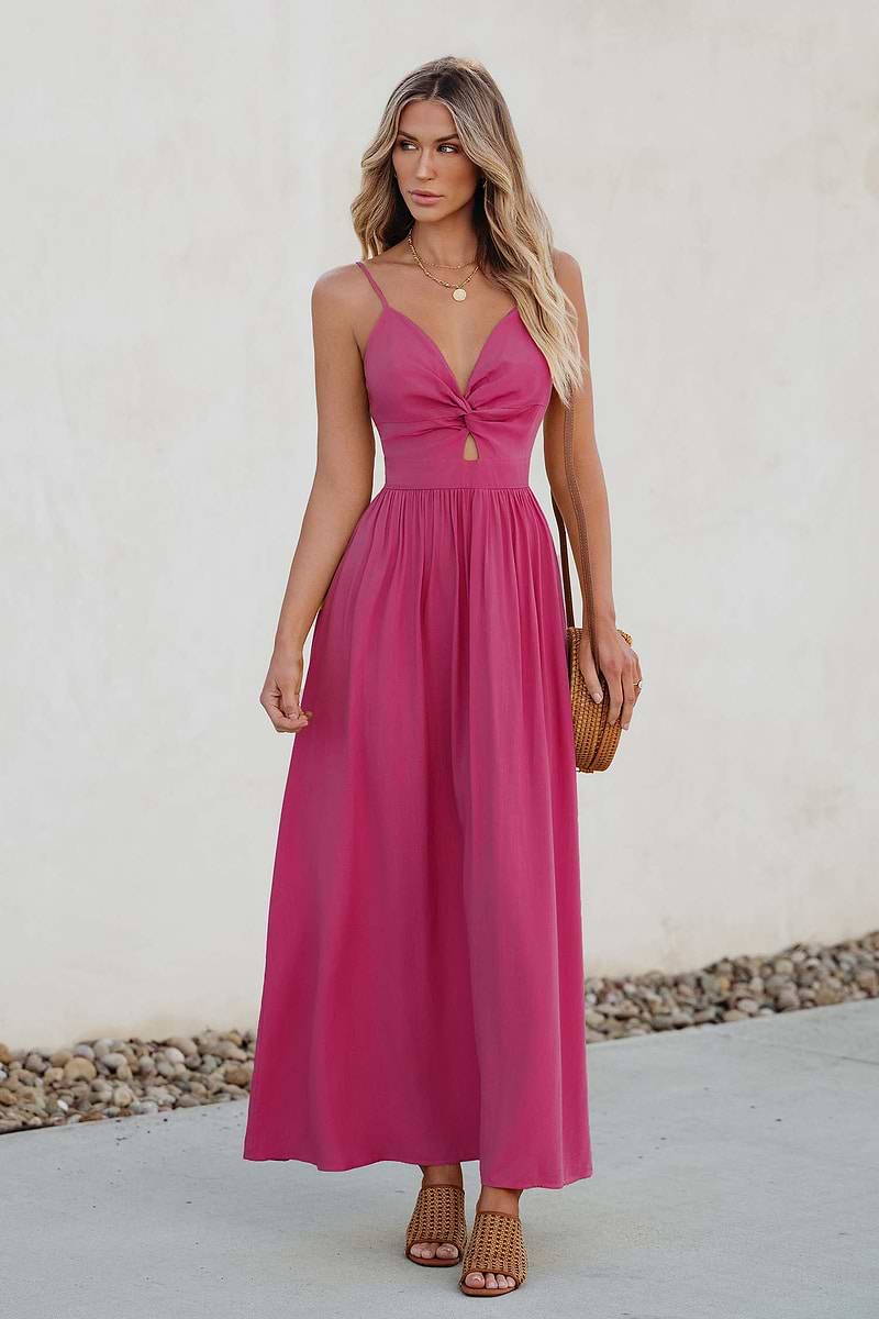Vestido largo rosa con escote en forma de corazón y abertura en forma de cerradura