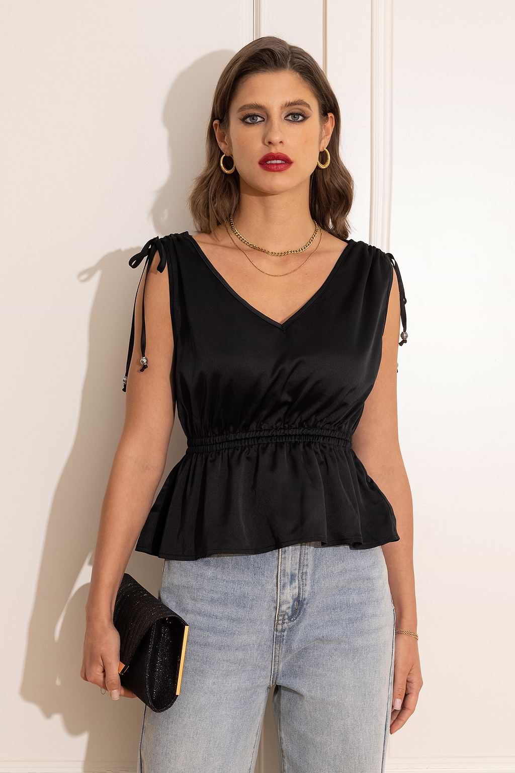 Black Sleeveless Peplum Top