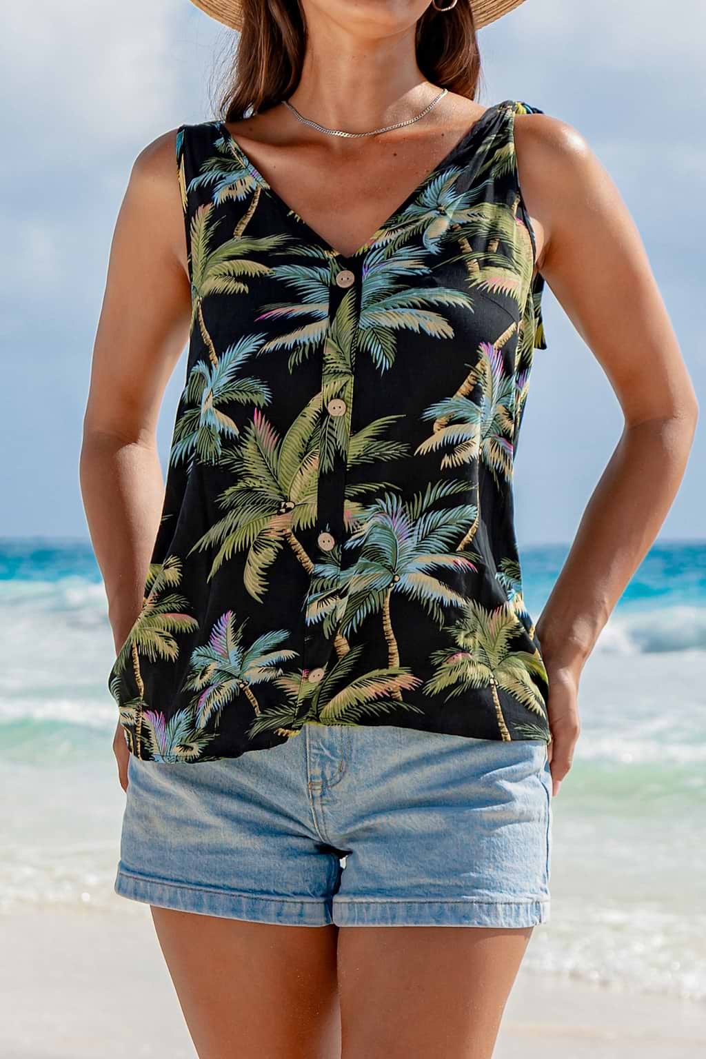 Mouwloze blouse met tropische stropdas en schouder