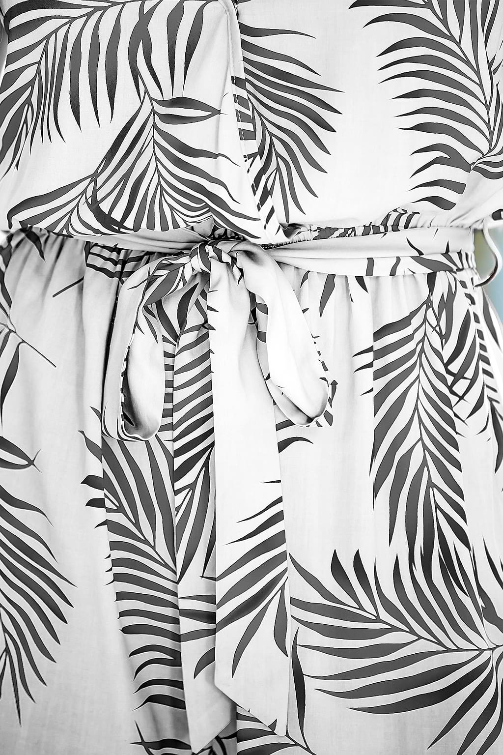 Tropical Surplice Flutter Sleeve Loose Leg Romper